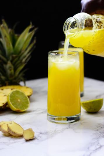 pineapple-ginger-juice-pouring-a-glass